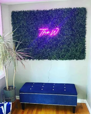 a purple sign that says the u on a wall at coastal and cozy beach stay, pet friendly in Milford