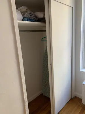 a closet with a door leading into a room at PRIME LOCATION 2 BEDROOMS APT UPPER EAST SIDe in New York