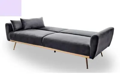 a black couch is shown on a white background at PRIME LOCATION 2 BEDROOMS APT UPPER EAST SIDe in New York