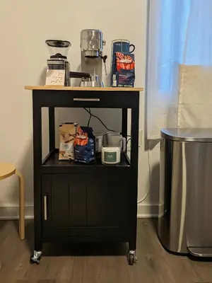 a black cart with a table with food on it at Apartment near Times Square Manhattan New York in New York