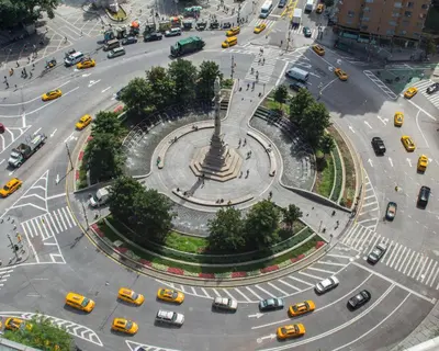an aerial view of a busy city intersection with cars at Double Room at a shared Apartment near Times Square in New York