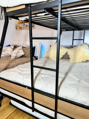 a black bunk bed with a white mattress at BP STAYS - Hotel-Style, No Host, Professionally Managed ID260 in Jersey City