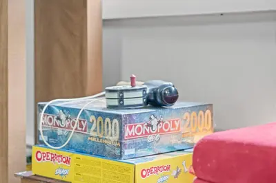 a toy camera sitting on top of a box at Lake Me Home in East Hampton