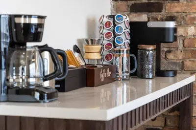 a counter with cups and other items on it at Hudson Escape W Hot Tub Bridge View in Highland