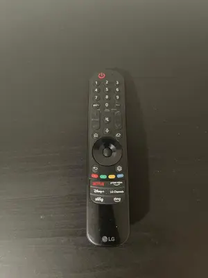 a remote control sitting on top of a table at The Peppermint in Mount Vernon