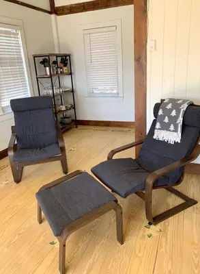 a living room with two chairs and a table at Cute Cozy Cottage Glenford New York in Glenford