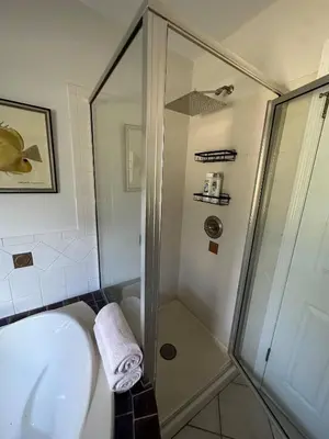 a bathroom with a shower and a sink at Beautiful Private Room Near Stony Brook University in Stony Brook