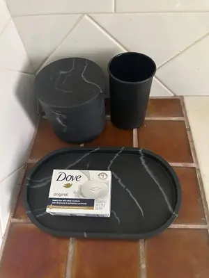 two black pots and a box on a floor at Beautiful Private Room Near Stony Brook University in Stony Brook