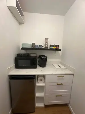 a kitchen with a counter top with a microwave at Beautiful Private Room Near Stony Brook University in Stony Brook