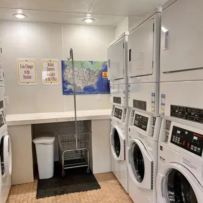 a laundry room with two washer and dryer at Cozy Mountain Dome Escape in the Catskills in Gilboa