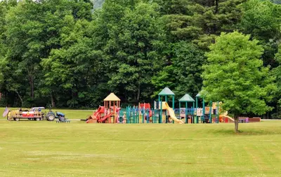 a park with a playground in a field at Luxury Catskill Mountains Dome Retreat in Gilboa