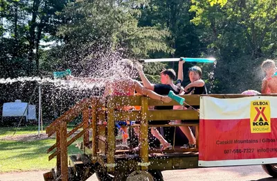 a group of people riding on a roller coaster at Luxury Catskill Mountains Dome Retreat in Gilboa