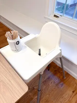 a white chair sitting next to a window at Family-Friendly 4 Bed 3 Bath Downtown Delight in Stamford