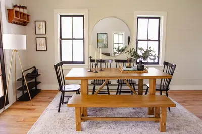 a dining room with a table and a mirror at Fire Pit, Private & Stylish Birdsong Schoolhouse in Barryville