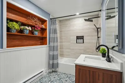 a bathroom with a sink and a tub and a shower at Myrtle Villa 7BR Near Mount Snow with Indoor Heated Endless Style Pool Outdoor Hot Tub in Dover