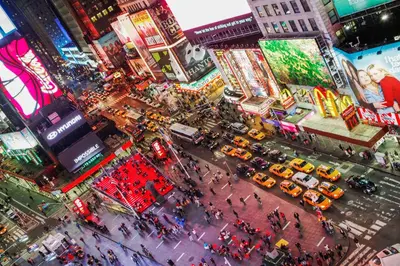 an overhead view of a busy city street with taxis at Double Room at a shared Apartment near Times Square in New York