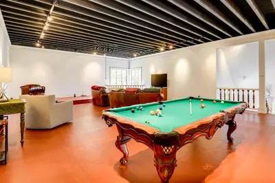 a living room with a pool table in it at 10 Mi to Mt Snow! Grand Estate Built to Entertain in Wilmington