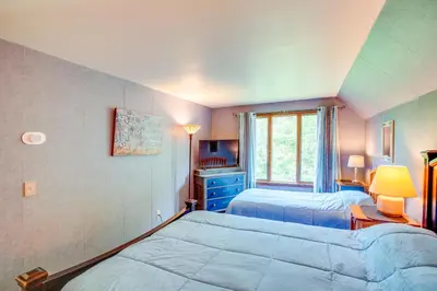 a bedroom with two beds and a window at Game Room, Hot Tub! Year-Round Dover Retreat in West Dover