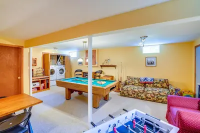a living room with a pool table in it at Game Room, Hot Tub! Year-Round Dover Retreat in West Dover