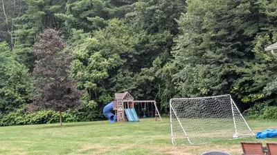 a park with a playground with a goal at 2 bedrooms with movie theater in Agawam