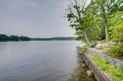 a view from the shore of a lake at Cabin on Crooked Lake Ski, Skate and Explore! in Averill Park