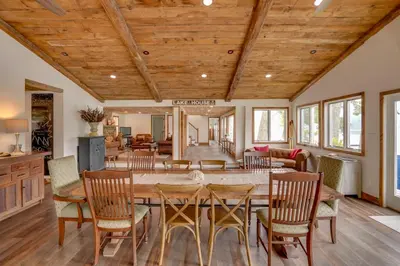 a dining room with a large table and chairs at Ski, Skate and Explore Ultimate Winter Getaway! in Averill Park
