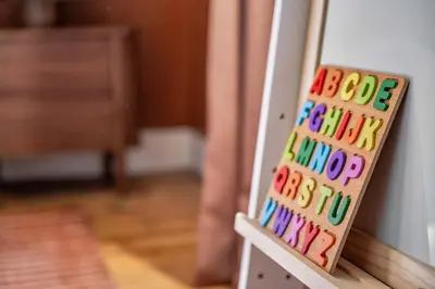 a picture of a colorful alphabet on a door at Hudson Valley Hot Tub Sauna Fire Pit Games in Hudson