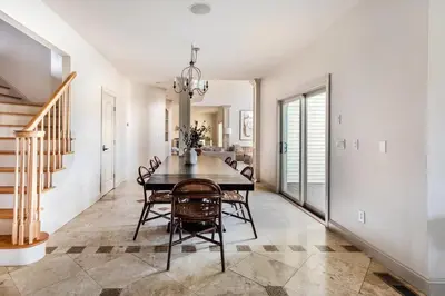 a dining room with a table and chairs at Rhinebrook Estate 8 Bed 11 Bath Sleeps 20 in Hyde Park