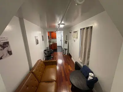 an overhead view of a living room with a couch at Private Studio Apartment in Union Square in New York