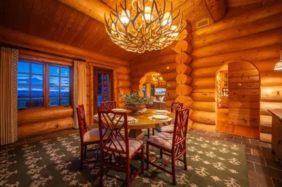a dining room with a table and chairs in a cabin at Welcome to the Lodge! Little Falls NY in Little Falls