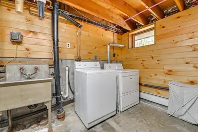 a laundry room with a washer and dryer at A-Frame Retreat Next to Grafton Lakes St Park