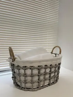 a basket sitting on a table in front of a window at MODERN 1BR Apt with PRIVATE deck in Albany
