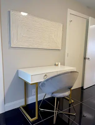 a white desk with a chair under a window at MODERN 1BR Apt with PRIVATE deck in Albany