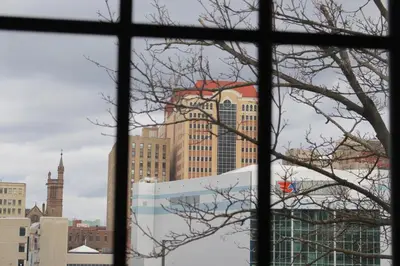 a view of a city from a window at WOW Bright Apt PRIME downtown Walk Everywhere in Albany
