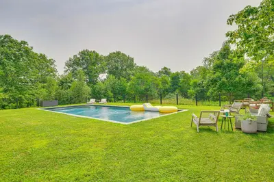 a swimming pool in the middle of a yard at On-Site Sledding! Hudson Valley Winter Escape in Pine Plains