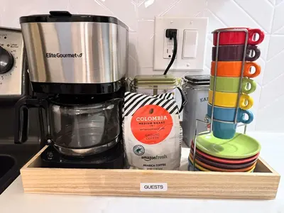 a kitchen counter with a blender and other kitchen utensils at 20 min NYC-Modern Private Room-Queen Bed-Parking Available But Confirm with Hosts in Jersey City