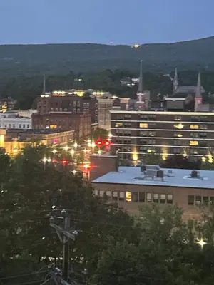 a city at night with buildings and street lights at The Allen House in North Adams