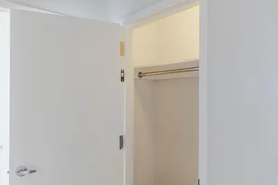 a shower door with a rod in a bathroom at Blueground Lenox Hill view nr Central Park NYC-2019 in New York
