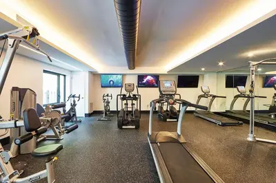 a gym with several tread machines in a room at Blueground Clinton Hill rooftop nr Fort Greene Park NYC-1979 in Brooklyn