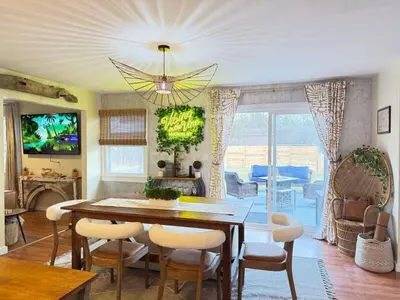 a dining room with a table and chairs at Vibing Hudson Retreat Pet-Friendly w Hot Tub in Hudson