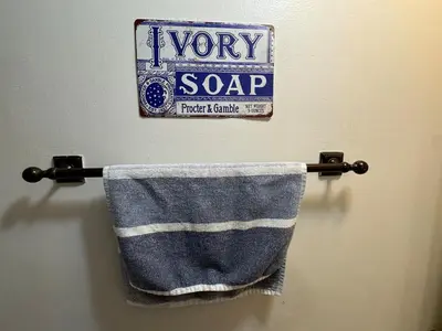 a towel hanging on a towel rack in a bathroom at West Village Apartment Rent 30 days or more in New York