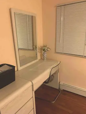 a desk with a mirror in a room at Cozy1B1B W Private Entrance in Jericho