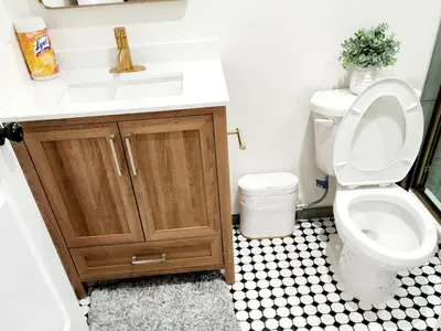 a bathroom with a sink and a toilet at Luxury 3BR Retreat Near NYC in Newark