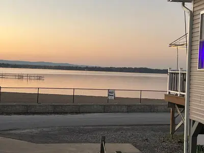 a view of the beach at sunset from a house at Saratoga Getaway in Saratoga Springs