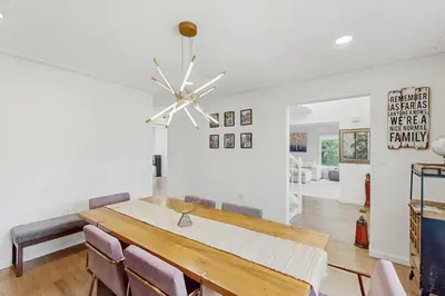 a dining room with a table and chairs at Blue Mountain Crossing in East Stroudsburg