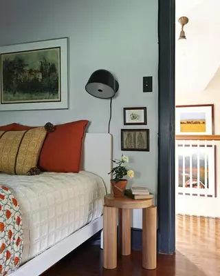 a bedroom with a bed and a table with a lamp at Argyll House by Boutique Litchfield Escape Villa in Harwinton