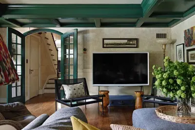 a living room with a tv and a couch at Argyll House by Boutique Litchfield Escape Villa in Harwinton