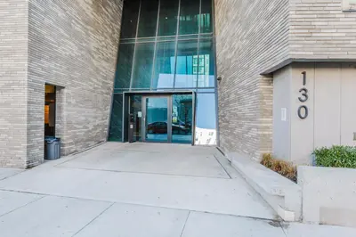 a building with a large glass door in front of it at Blueground Williamsburg rooftop nr McCarren Park NYC-2076 in Brooklyn