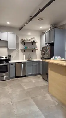 a large kitchen with stainless steel appliances and counters at ROOM IN WILLIAMBURG IN A 2BEDROOMS APt in Brooklyn