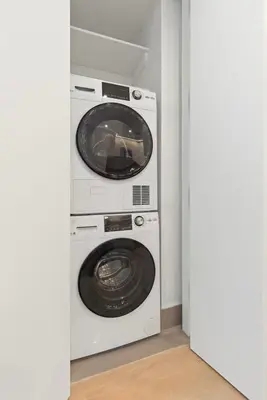 a washing machine and a dryer in a room at Brooklyn - Dumbo - 2-bedroom, 2-bath apartment in Brooklyn